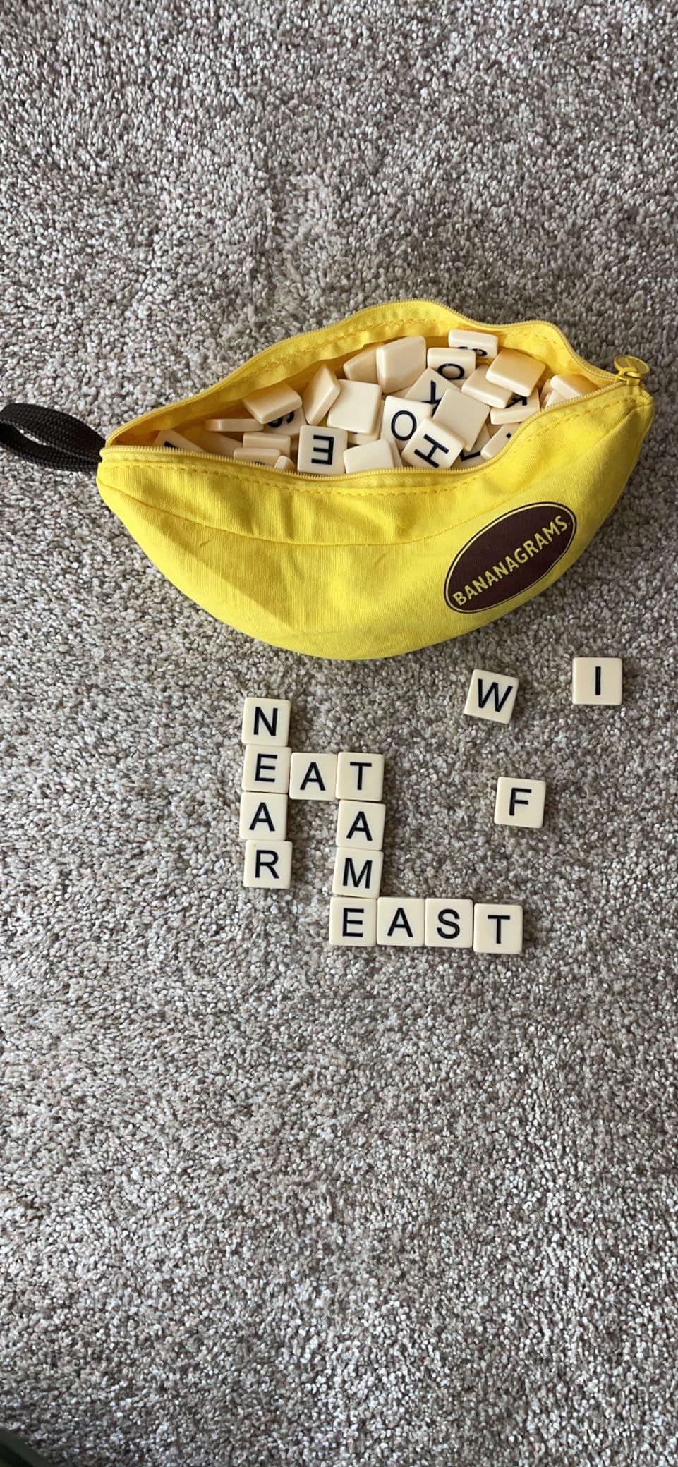 Bananagrams Classic Word Game, 144 Tiles in Banana Pouch, Travel Game | Fast-paced spelling & anagram game for 1-8 players; portable pouch, educational wordplay for kids and adults ages 7+ customer photo 2