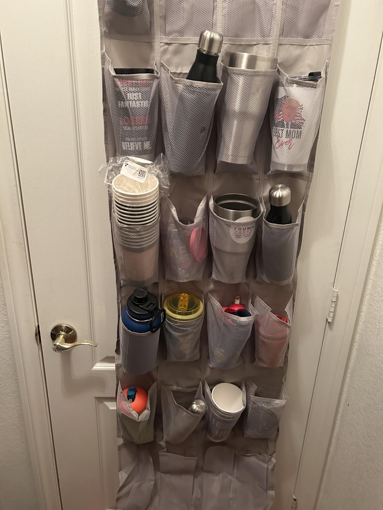 Amazon Basics 24 Medium Mesh Pocket Over-the-Door Hanging Shoe Organizer, Space Saving Shoe Storage, Light Grey | Over-the-Door customer photo 1