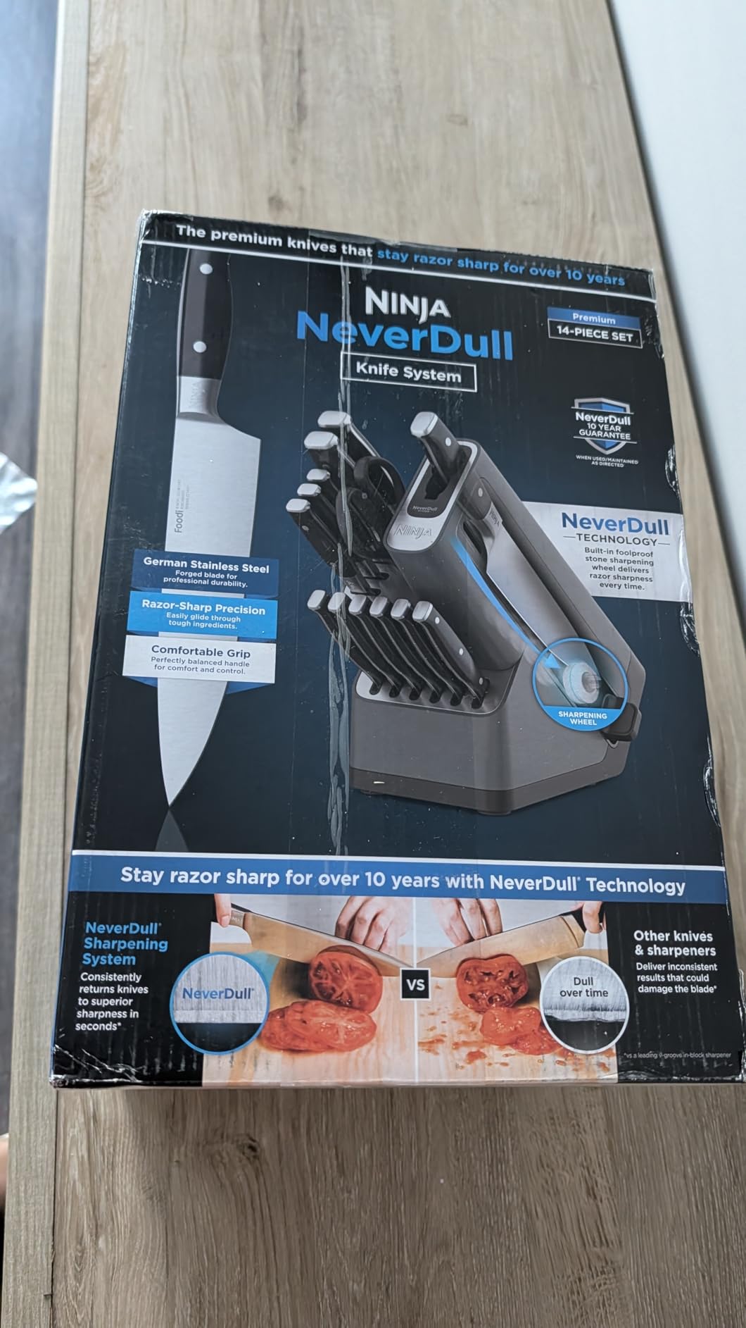 Ninja K32012 Foodi NeverDull Premium Knife System, 12 Piece Knife Block Set with Built-in Sharpener, German Stainless Steel Knives, Black | Stays razor-sharp 10+ years. German stainless steel blades. A few swipes of the foolproof sharpener restores a superior edge. customer photo 1