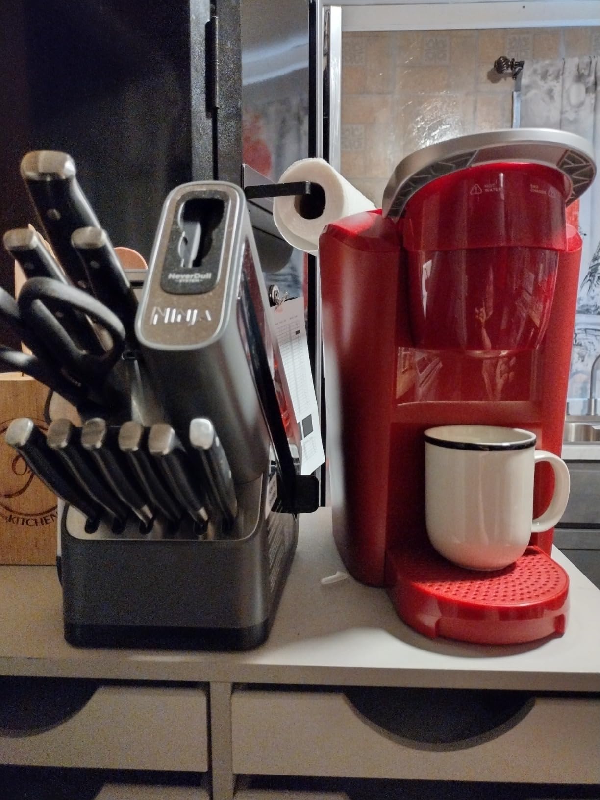 Ninja K32012 Foodi NeverDull Premium Knife System, 12 Piece Knife Block Set with Built-in Sharpener, German Stainless Steel Knives, Black | Stays razor-sharp 10+ years. German stainless steel blades. A few swipes of the foolproof sharpener restores a superior edge. customer photo 2