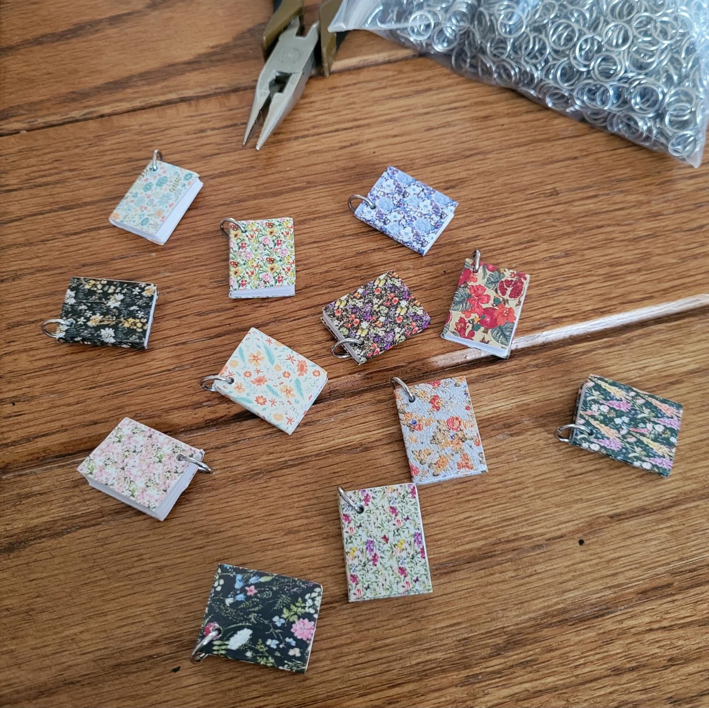 Skylety 24 Pieces 1:12 Scale Miniatures Dollhouse Books Assorted Miniatures Dollhouse Accessories Small Books Decoration Accessories Doll Toy Supplies (Floral Style) customer photo 1