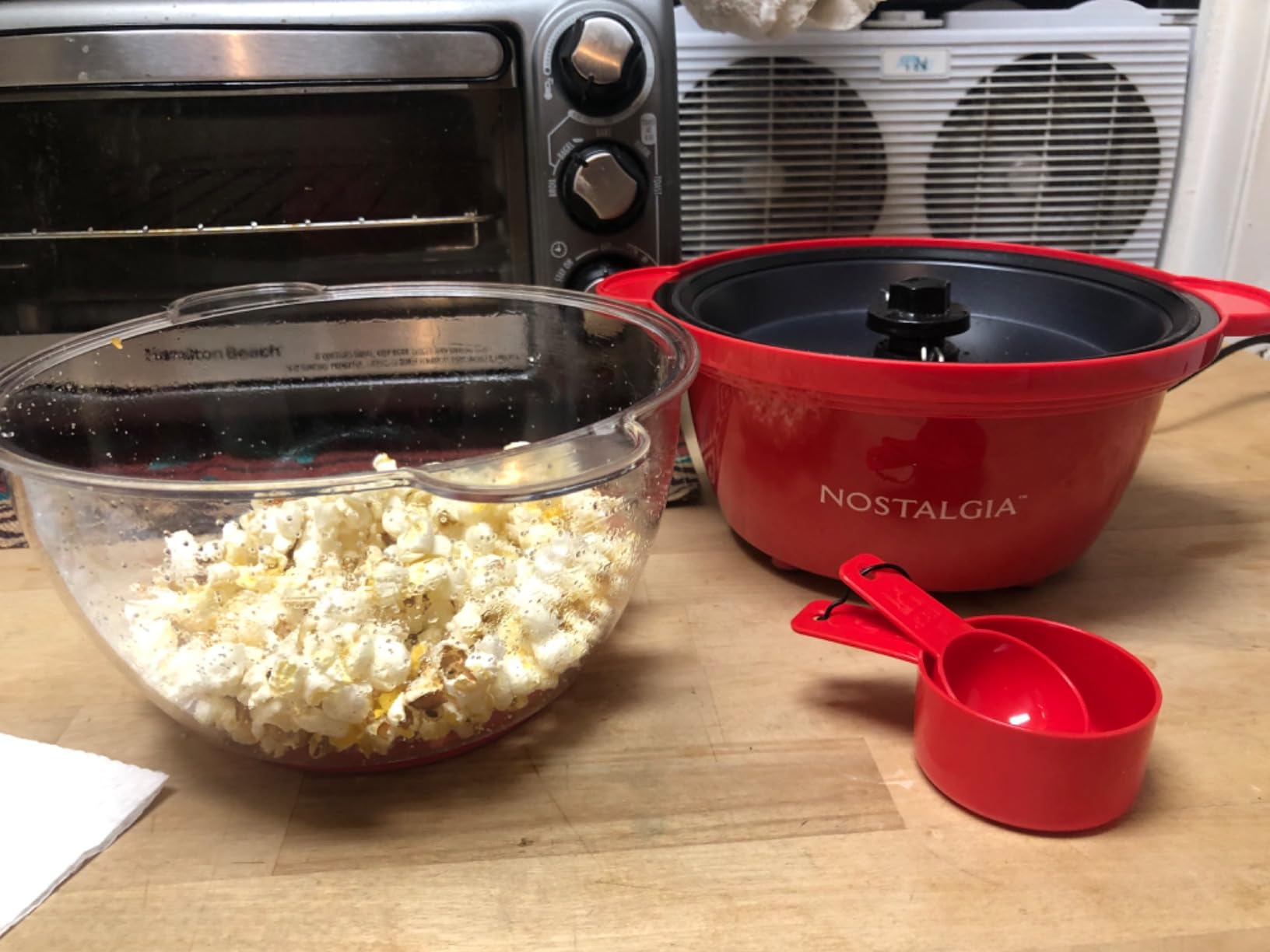 Nostalgia Electric Non-Stick Stirring Popcorn Machine with Hot Oil - Popcorn Popper with Dual-Use Bowl & Cool-Touch Handles - Popcorn Maker for 8 Cups of Theater Style Popcorn - Red customer photo 1