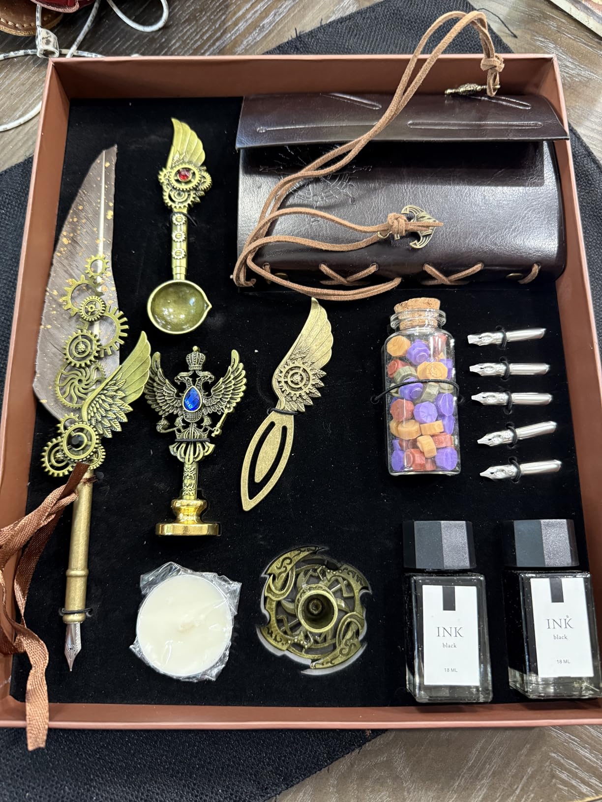 GrnVibe Quill Pen and Ink Set,Calligraphy Pen Set for beginners | Feather Pen Set with Leather Notebook,Pen Holder,5 Replaceable Nibs,Bookmark,Letter Writing Kit & Wax Seal Stamp Kit,Gift Set customer photo 1
