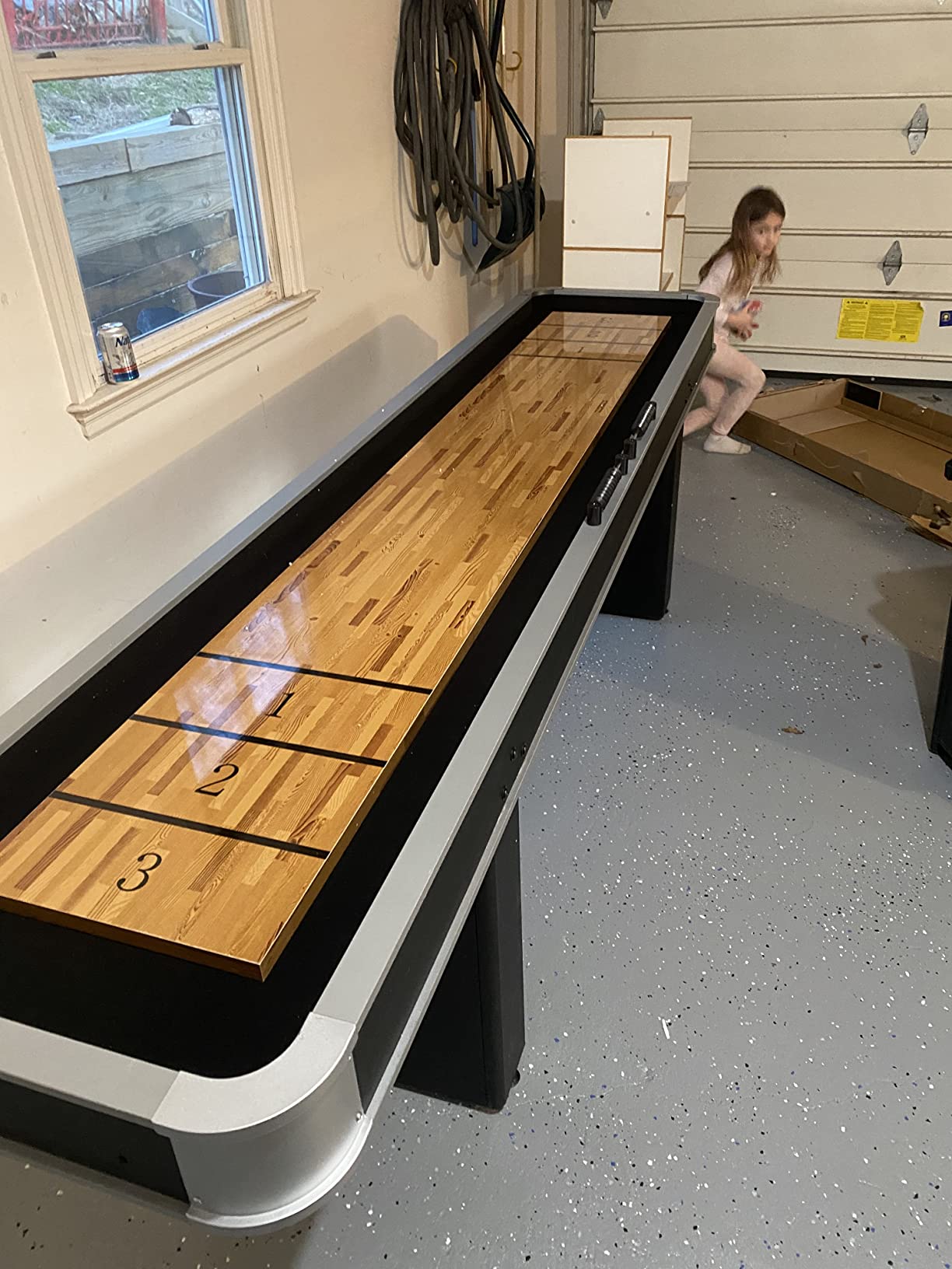Atomic 9’ LED Shuffleboard Tables with Poly-Coated Playing Surface for Smooth, Fast Puck Action and Pedestal Legs with Levelers for Optimum Stability and Level Play customer photo 1