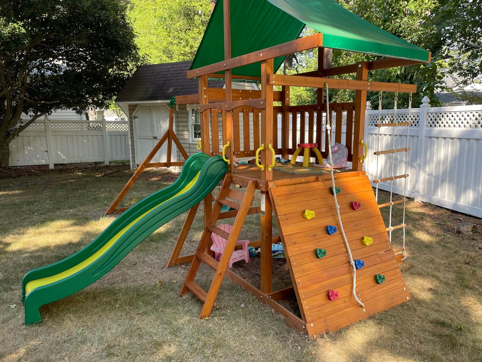 Backyard Discovery Mount Mckinley Cedar Wood Swing Set with Wave Slide, Play Deck, Double Rock Wall, Rope Ladder, Web Swing, Belt Swings, Toy Telescope, Steering Wheel, Sandbox Area, Outdoor Playset customer photo 1