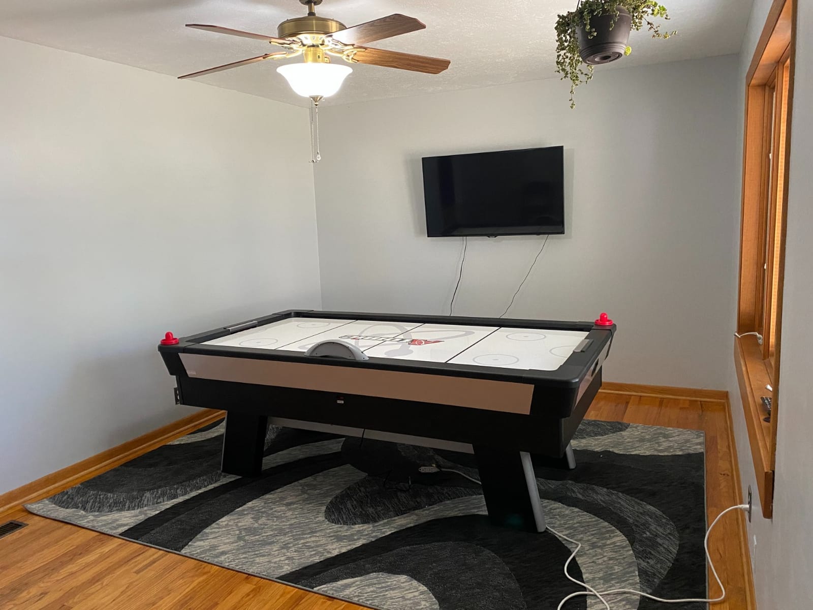 Atomic Top Shelf 7.5ft Air Hockey Table with LED Lighting | 120V motor, high-speed PVC surface. LED Lumen-X multicolor lighting and music. Includes LED pushers and hexagonal puck. customer photo 1