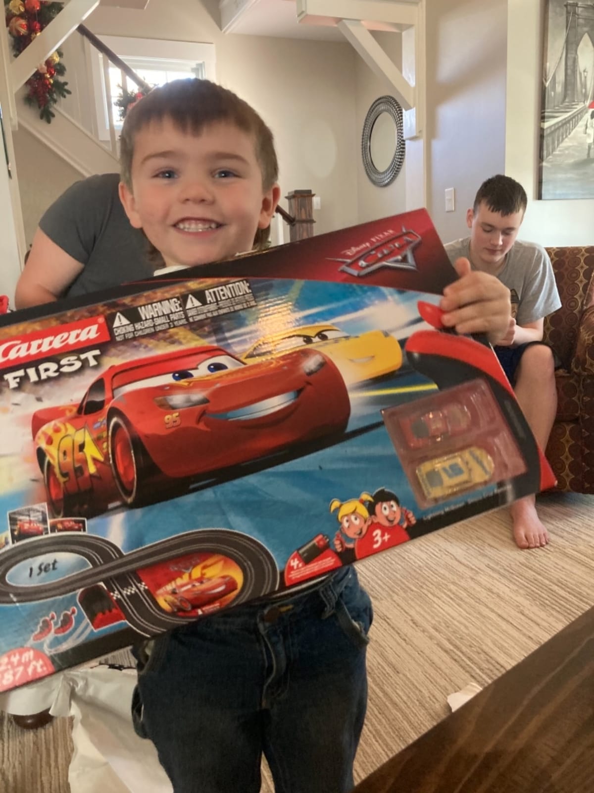Carrera First Disney/Pixar Cars 3 - Slot Car Race Track - Includes 2 Cars: Lightning McQueen and Dinoco Cruz - Battery-Powered Beginner Racing Set for Kids Ages 3 Years and Up customer photo 2