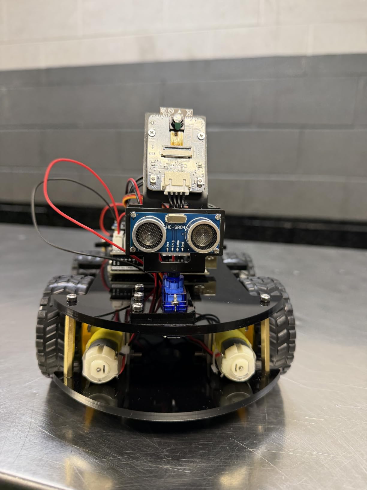 ELEGOO UNO R3 Smart Robot Car Kit V4 with Camera, Compatible with Arduino | FPV Video, Line Tracking, Obstacle Avoidance, Auto Follow, App & IR Control, Class STEM Building & Coding Kit, Gift for 12+ customer photo 1