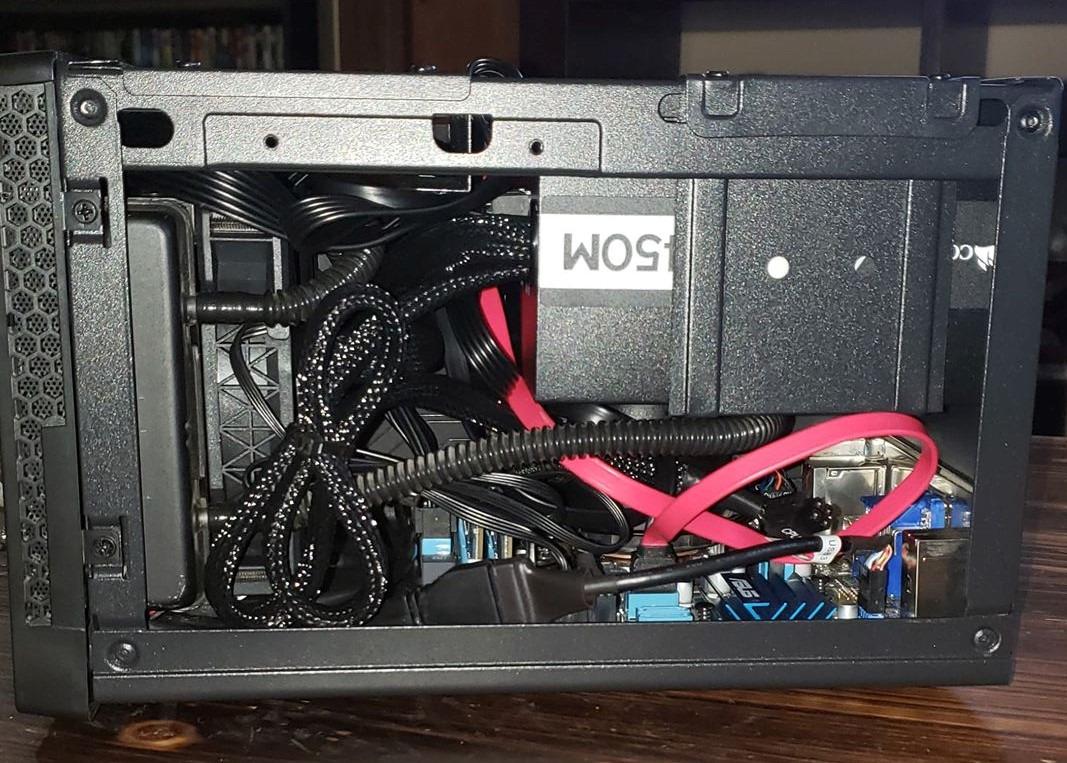 SilverStone Technology Ultra Compact Mini-ITX Computer Case with Mesh Front Panel Black (SST-SG13B-USA) customer photo 1