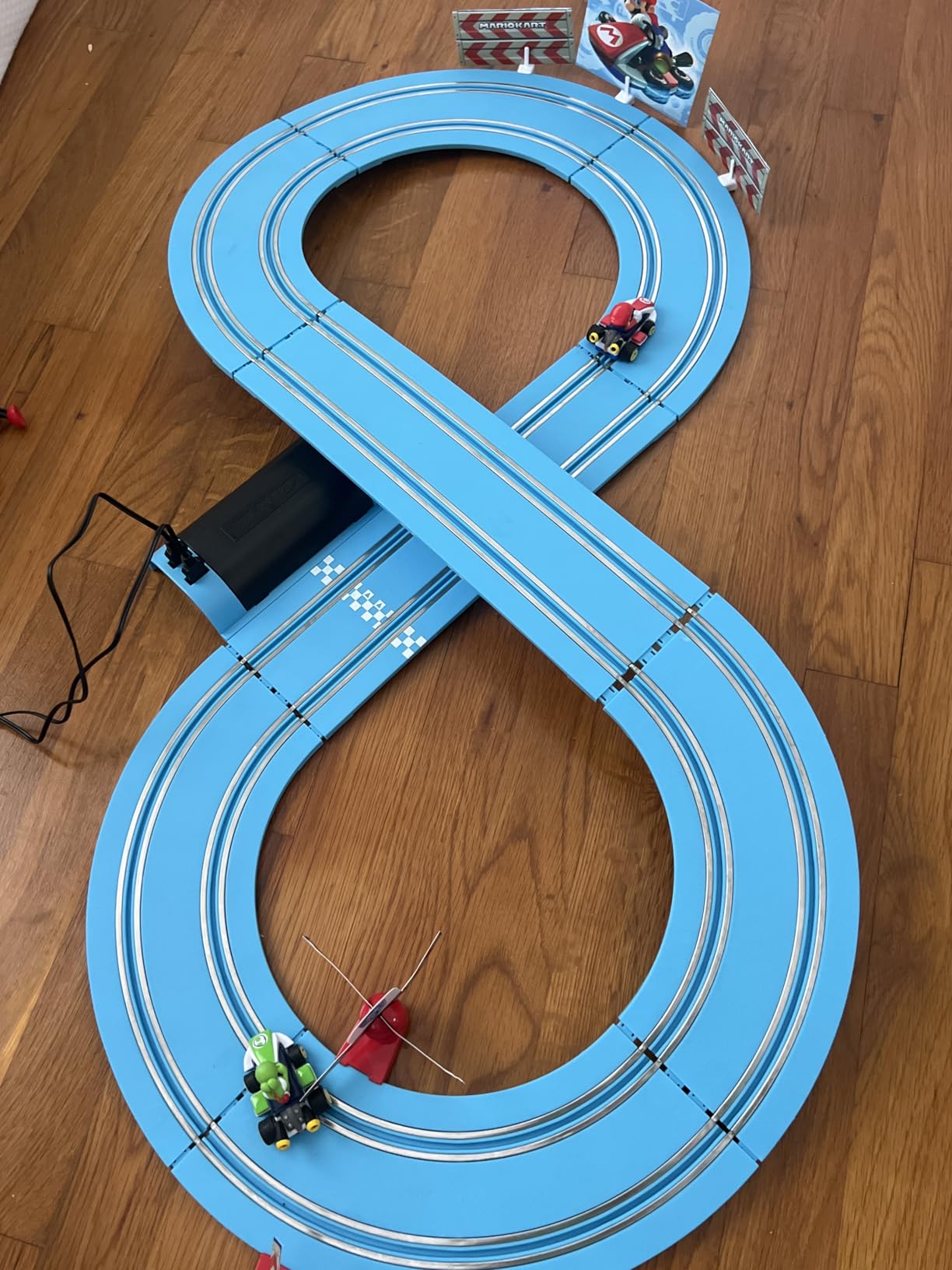 Carrera First Mario Kart - Slot Car Race Track with Spinners - Includes 2 Cars: Mario and Yoshi - Battery-Powered Beginner Toy Racing Set for Kids Ages 3 Years and Up customer photo 1