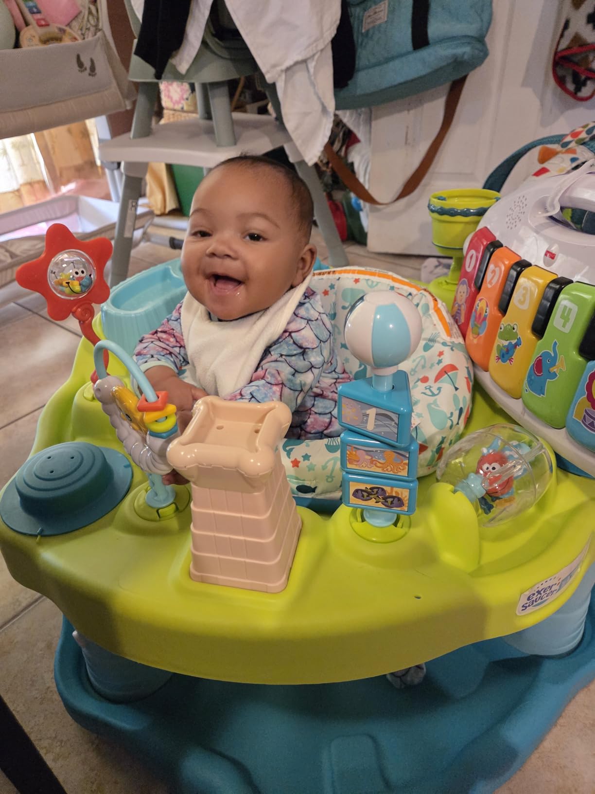 Evenflo Exersaucer Seaside Splash Activity Center | 3 Height Modes up to 30 in., Ages 4-12 Months, 7 Interactive Toys, Dishwasher Safe Tray, Machine Washable Seat Pad customer photo 1
