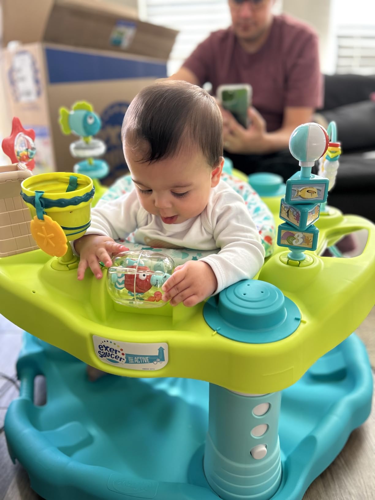 Evenflo Exersaucer Seaside Splash Activity Center | 3 Height Modes up to 30 in., Ages 4-12 Months, 7 Interactive Toys, Dishwasher Safe Tray, Machine Washable Seat Pad customer photo 2