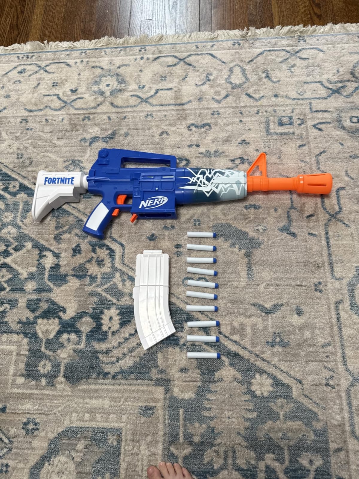 Nerf Fortnite Blue Shock Blaster, 10-Dart Clip, 10 Elite Nerf Darts, Includes Bonus Code to Unlock The Beat Wrap in The Game, Motorized Dart Blaster customer photo 1