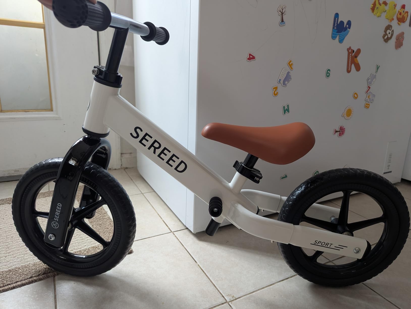 SEREED Toddler Balance Bike 2 Year Old, Gift for 2-3 Boys Girls, Adjustable | No Pedal Kids Toy Bike for 2-5 Years Old, Customize Plate with 3pcs Stickers (White) customer photo 1