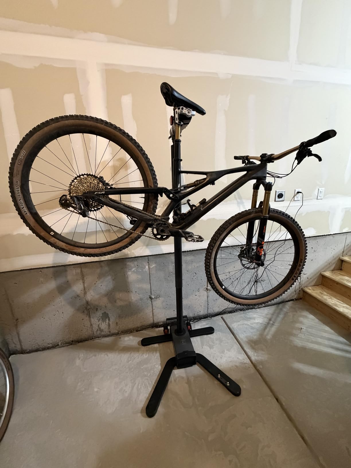 Pro E Lift Bike Repair Stand, 100lb Capacity, For E-Bikes | Foot-pedal electric lift raises heavy bikes hands-free; mobile tilt-and-roll base supports home and shop workflows customer photo 2