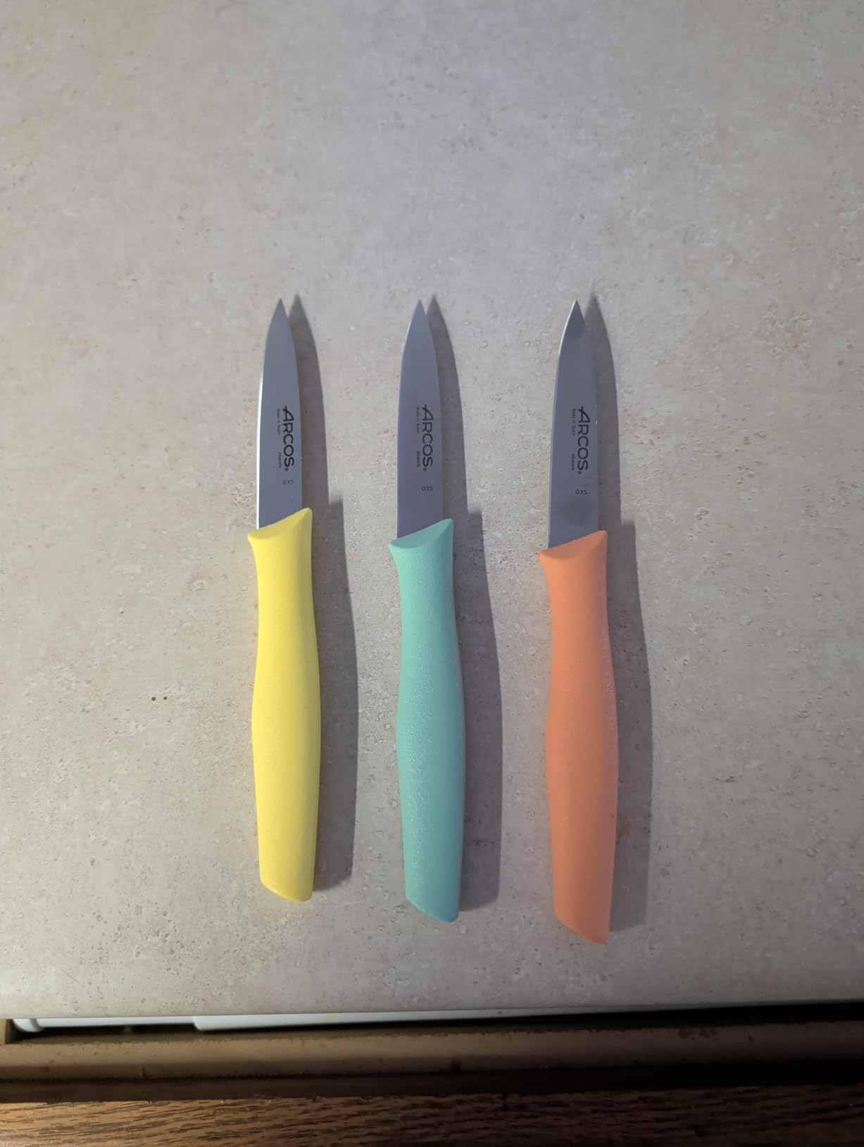 Arcos Paring Knife Set of 3 Pieces 4 Inch Stainless Steel. Colorful Kitchen Knives for Peeling Fruits and Vegetables. Ergonomic Polypropylene Handle. Series Nova. Color Orange, Yellow and Blue. customer photo 2